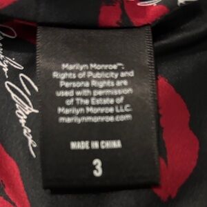 Marilyn Monroe Woman’s Black and White with red lips inside lining Coat